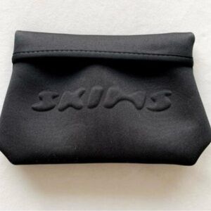 New in plastic Skims small bag